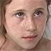 a young girl takes a bath